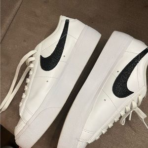 Nike women’s platform blazers. Size 9.5. Used. Black and white